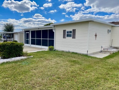 This home has a lot to offer. This is a large open floor plan on Water Oak Country Club Estates in Florida - for sale on GolfHomes.com, golf home, golf lot