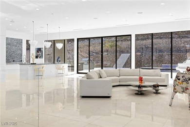 Welcome to 1455 Macdonald Ranch Dr--an exquisite desert oasis on Dragon Ridge Country Club in Nevada - for sale on GolfHomes.com, golf home, golf lot