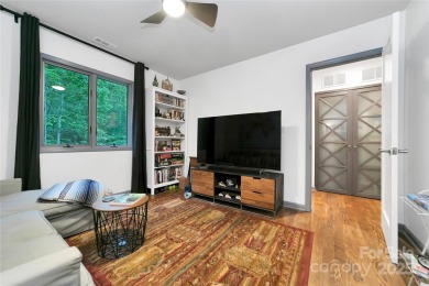 Natural-light-filled condo with river views, surrounded by on Sherwood Forest Golf Club in North Carolina - for sale on GolfHomes.com, golf home, golf lot