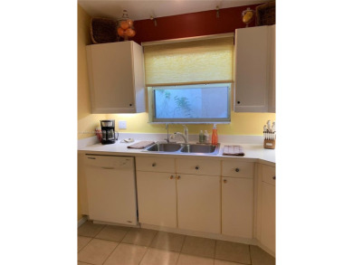 NEW TO THE MARKET 3/2 PONDVIEW HOME IN PRESTIGIOUS CANTERBURY on PGA National Golf Club in Florida - for sale on GolfHomes.com, golf home, golf lot