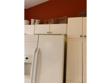 NEW TO THE MARKET 3/2 PONDVIEW HOME IN PRESTIGIOUS CANTERBURY on PGA National Golf Club in Florida - for sale on GolfHomes.com, golf home, golf lot