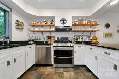 Natural-light-filled condo with river views, surrounded by on Sherwood Forest Golf Club in North Carolina - for sale on GolfHomes.com, golf home, golf lot