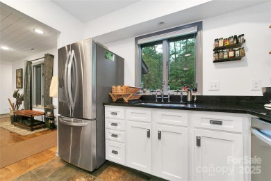 Natural-light-filled condo with river views, surrounded by on Sherwood Forest Golf Club in North Carolina - for sale on GolfHomes.com, golf home, golf lot