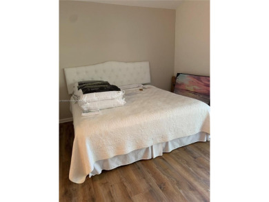 NEW TO THE MARKET 3/2 PONDVIEW HOME IN PRESTIGIOUS CANTERBURY on PGA National Golf Club in Florida - for sale on GolfHomes.com, golf home, golf lot