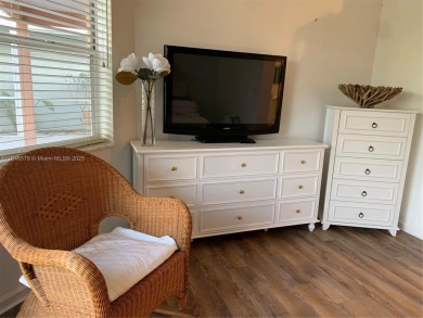 NEW TO THE MARKET 3/2 PONDVIEW HOME IN PRESTIGIOUS CANTERBURY on PGA National Golf Club in Florida - for sale on GolfHomes.com, golf home, golf lot