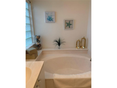 NEW TO THE MARKET 3/2 PONDVIEW HOME IN PRESTIGIOUS CANTERBURY on PGA National Golf Club in Florida - for sale on GolfHomes.com, golf home, golf lot