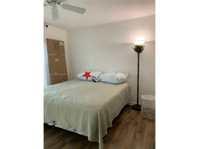 NEW TO THE MARKET 3/2 PONDVIEW HOME IN PRESTIGIOUS CANTERBURY on PGA National Golf Club in Florida - for sale on GolfHomes.com, golf home, golf lot