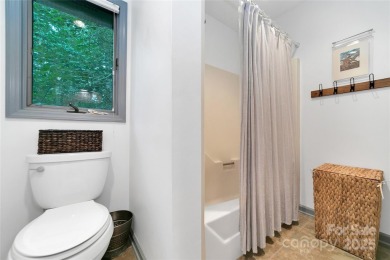 Natural-light-filled condo with river views, surrounded by on Sherwood Forest Golf Club in North Carolina - for sale on GolfHomes.com, golf home, golf lot