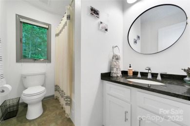 Natural-light-filled condo with river views, surrounded by on Sherwood Forest Golf Club in North Carolina - for sale on GolfHomes.com, golf home, golf lot