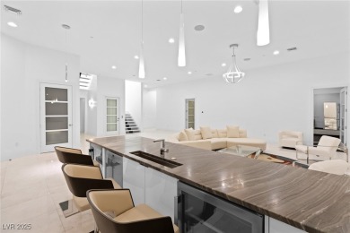Welcome to 1455 Macdonald Ranch Dr--an exquisite desert oasis on Dragon Ridge Country Club in Nevada - for sale on GolfHomes.com, golf home, golf lot