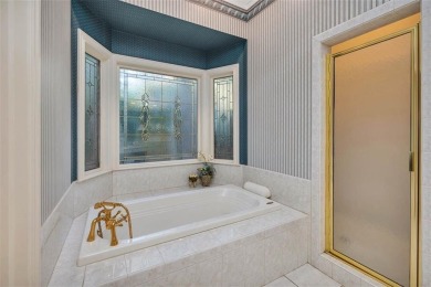 Enjoy lagoon views in this elegant island retreat nestled in the on Sea Island Golf Club in Georgia - for sale on GolfHomes.com, golf home, golf lot