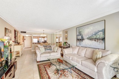 WELCOME TO THIS SPARKLING FULLY TILED CORNER CONDO AVAILABLE on Poinciana Golf Club in Florida - for sale on GolfHomes.com, golf home, golf lot