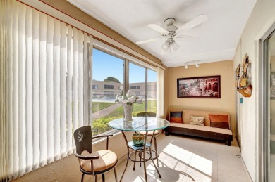 WELCOME TO THIS SPARKLING FULLY TILED CORNER CONDO AVAILABLE on Poinciana Golf Club in Florida - for sale on GolfHomes.com, golf home, golf lot