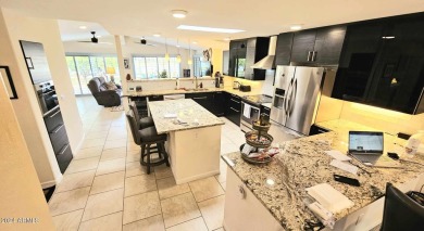 Gorgeous COMPLETELY renovated home ON the lake in desirable Sun on Sun Lakes Country Club in Arizona - for sale on GolfHomes.com, golf home, golf lot