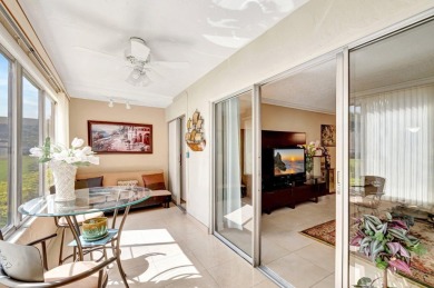 WELCOME TO THIS SPARKLING FULLY TILED CORNER CONDO AVAILABLE on Poinciana Golf Club in Florida - for sale on GolfHomes.com, golf home, golf lot