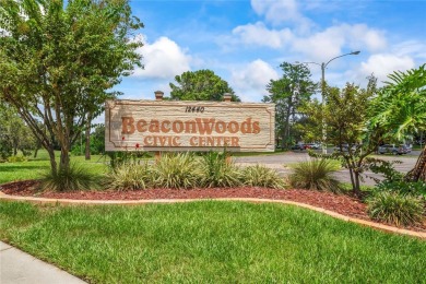 Welcome to this incredibly spacious three-bedroom, two-bathroom on Beacon Woods Golf Club in Florida - for sale on GolfHomes.com, golf home, golf lot