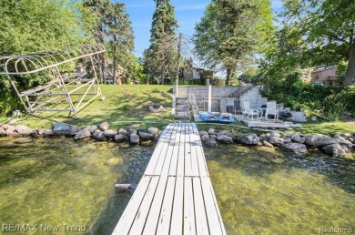 Shared Lake Frontage with Dock on All Sports Pine Lake!  This on Pine Lake Country Club in Michigan - for sale on GolfHomes.com, golf home, golf lot