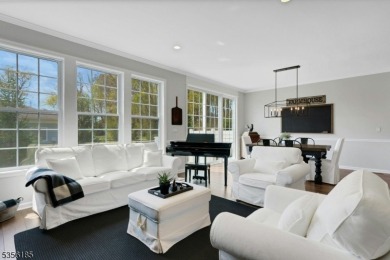 With three levels of luxury space, this Belmont model  is on Morris County Golf Club in New Jersey - for sale on GolfHomes.com, golf home, golf lot