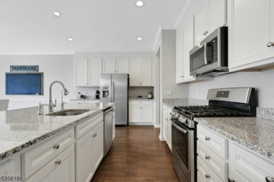 With three levels of luxury space, this Belmont model  is on Morris County Golf Club in New Jersey - for sale on GolfHomes.com, golf home, golf lot