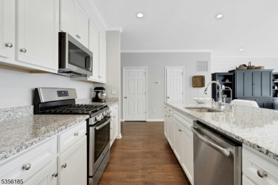 With three levels of luxury space, this Belmont model  is on Morris County Golf Club in New Jersey - for sale on GolfHomes.com, golf home, golf lot
