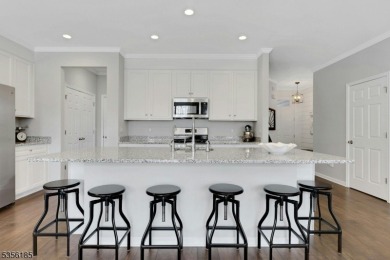With three levels of luxury space, this Belmont model  is on Morris County Golf Club in New Jersey - for sale on GolfHomes.com, golf home, golf lot