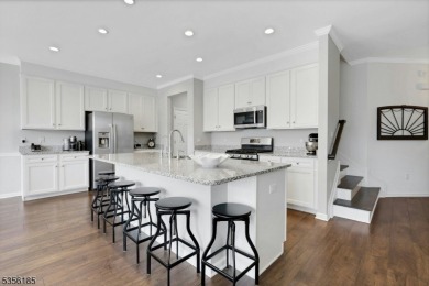 With three levels of luxury space, this Belmont model  is on Morris County Golf Club in New Jersey - for sale on GolfHomes.com, golf home, golf lot