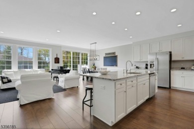 With three levels of luxury space, this Belmont model  is on Morris County Golf Club in New Jersey - for sale on GolfHomes.com, golf home, golf lot