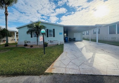 WELCOME HOME!! THIS OPEN PLAN 2-BEDROOM, 2-BATHROOM HOME IS on Cypress Greens in Florida - for sale on GolfHomes.com, golf home, golf lot