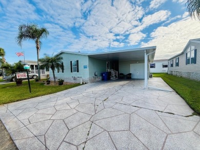 WELCOME HOME!! THIS OPEN PLAN 2-BEDROOM, 2-BATHROOM HOME IS on Cypress Greens in Florida - for sale on GolfHomes.com, golf home, golf lot