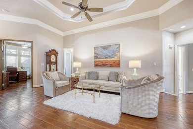 Gorgeous 4-bedroom, 3-bathroom home totaling 3,373 square feet on Pecan Plantation Country Club in Texas - for sale on GolfHomes.com, golf home, golf lot