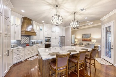 Gorgeous 4-bedroom, 3-bathroom home totaling 3,373 square feet on Pecan Plantation Country Club in Texas - for sale on GolfHomes.com, golf home, golf lot