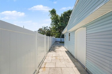 Some photos are Virtually Staged. Refined Coastal Elegance of on St. Petersburg Country Club in Florida - for sale on GolfHomes.com, golf home, golf lot