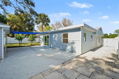 Some photos are Virtually Staged. Refined Coastal Elegance of on St. Petersburg Country Club in Florida - for sale on GolfHomes.com, golf home, golf lot