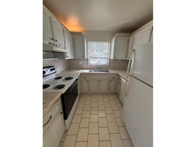 2nd Floor End Unit with Gorgeous, unobstructed Water & Golf on Pine Lakes Golf Club in Florida - for sale on GolfHomes.com, golf home, golf lot