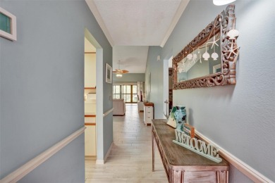Welcome to your new home in Paradise!  Enjoy peaceful golf on Palm Aire Country Club of Sarasota in Florida - for sale on GolfHomes.com, golf home, golf lot