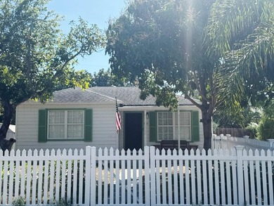 Welcome to this charming Florida Bungalow with tons of natural on West Palm Beach Golf Course in Florida - for sale on GolfHomes.com, golf home, golf lot