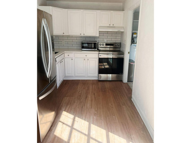 Welcome to this charming Florida Bungalow with tons of natural on West Palm Beach Golf Course in Florida - for sale on GolfHomes.com, golf home, golf lot