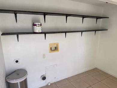 Welcome to this charming Florida Bungalow with tons of natural on West Palm Beach Golf Course in Florida - for sale on GolfHomes.com, golf home, golf lot