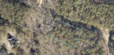 Come build your dream home on this interior wooded lot in on Reynolds Lake Oconee - The Landing in Georgia - for sale on GolfHomes.com, golf home, golf lot
