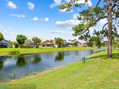 Located in prestigious Boca Woods Country Club two bedroom, two on Boca Woods Country Club in Florida - for sale on GolfHomes.com, golf home, golf lot