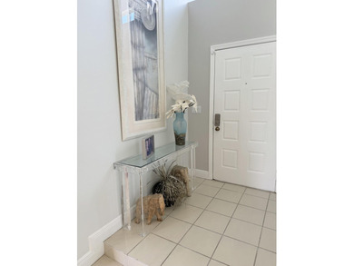 Fabulous 4 bed 3 bath home in prestigious Tiffany Trace located on The Boca Country Club in Florida - for sale on GolfHomes.com, golf home, golf lot