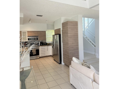 Fabulous 4 bed 3 bath home in prestigious Tiffany Trace located on The Boca Country Club in Florida - for sale on GolfHomes.com, golf home, golf lot