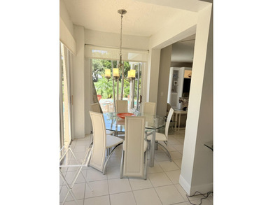 Fabulous 3 bed 3 bath home in prestigious Tiffany Trace located on The Boca Country Club in Florida - for sale on GolfHomes.com, golf home, golf lot