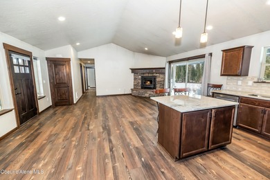 This beautiful single-level home sits on the Priest Lake Golf on Priest Lake Golf and Tennis Club in Idaho - for sale on GolfHomes.com, golf home, golf lot