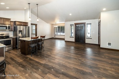 This beautiful single-level home sits on the Priest Lake Golf on Priest Lake Golf and Tennis Club in Idaho - for sale on GolfHomes.com, golf home, golf lot