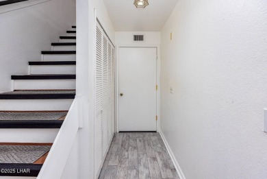 This lovely condo is located by the lakeside and is just a short on London Bridge Golf Course in Arizona - for sale on GolfHomes.com, golf home, golf lot