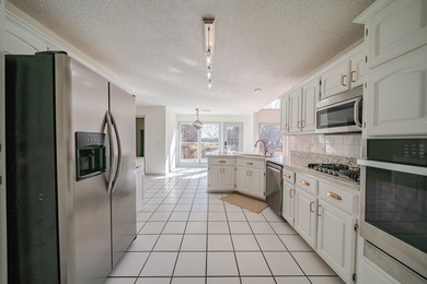 *Maple Ridge with a view!* This 4 bedroom, 2.5 bath, brick home on Maple Ridge Golf Club in Georgia - for sale on GolfHomes.com, golf home, golf lot