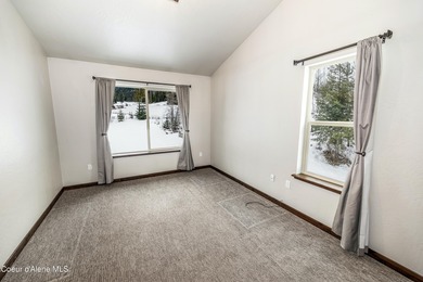 This beautiful single-level home sits on the Priest Lake Golf on Priest Lake Golf and Tennis Club in Idaho - for sale on GolfHomes.com, golf home, golf lot