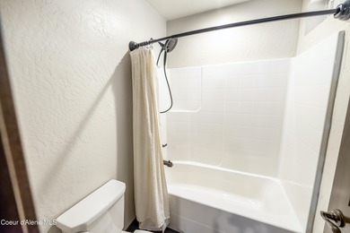 This beautiful single-level home sits on the Priest Lake Golf on Priest Lake Golf and Tennis Club in Idaho - for sale on GolfHomes.com, golf home, golf lot