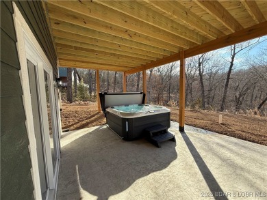Experience unparalleled luxury living at the Estates of on The Club At Old Kinderhook in Missouri - for sale on GolfHomes.com, golf home, golf lot